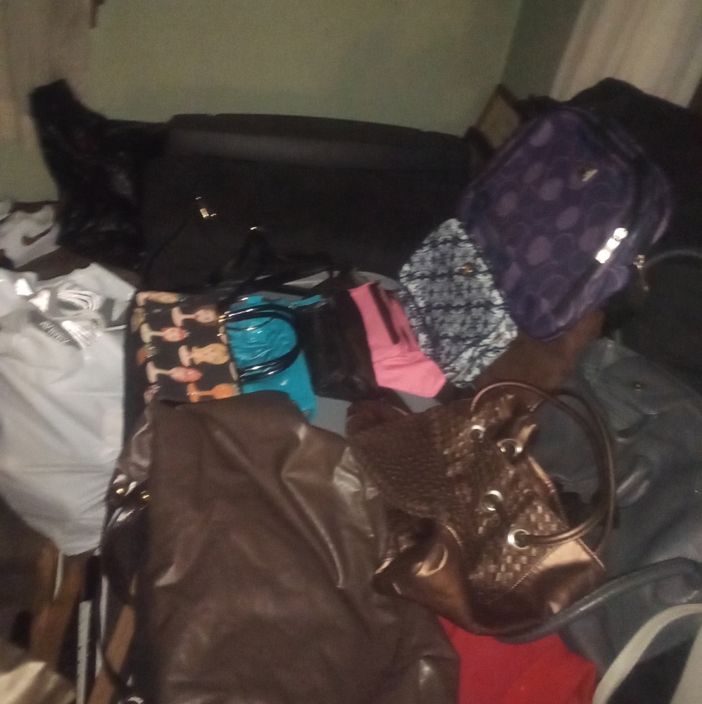 Assortment of coin purses,2 fanny packs, small MK , and other brands